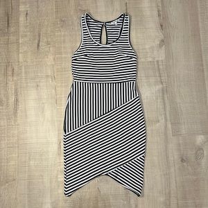 Black and white striped racerback bandage mini dress with asymetrical hemline